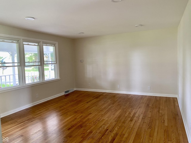1400 Evelyn Ln, Anderson, IN 46017 - spare room with wood finished floors