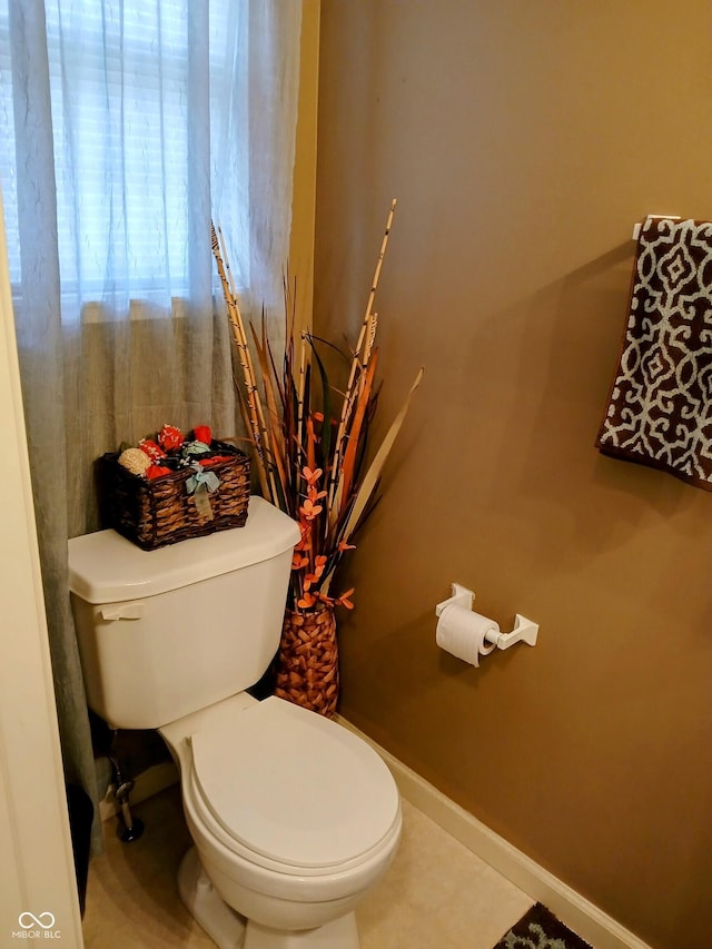 8333 Pine Branch Ln, Indianapolis, IN 46234 - bathroom with toilet and baseboards