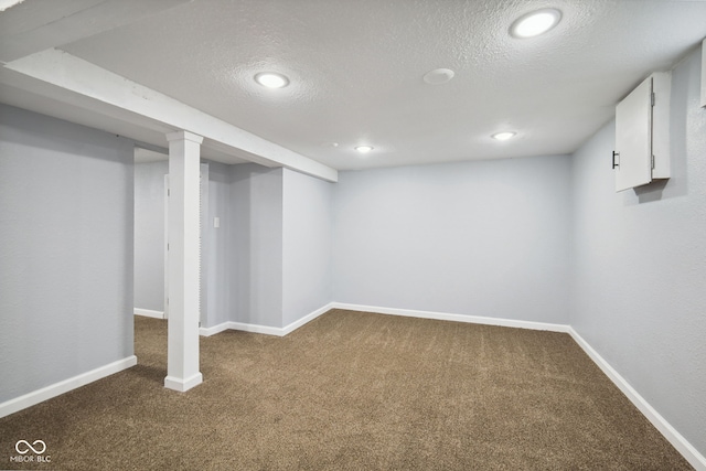 11710 W State Road 32, Yorktown, IN 47396 - finished basement with dark colored carpet, a textured ceiling, and recessed lighting