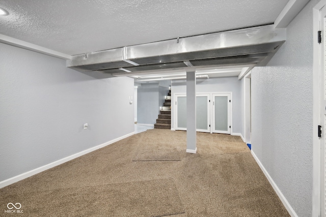 11710 W State Road 32, Yorktown, IN 47396 - finished basement featuring stairway, carpet flooring, a textured ceiling, and a textured wall