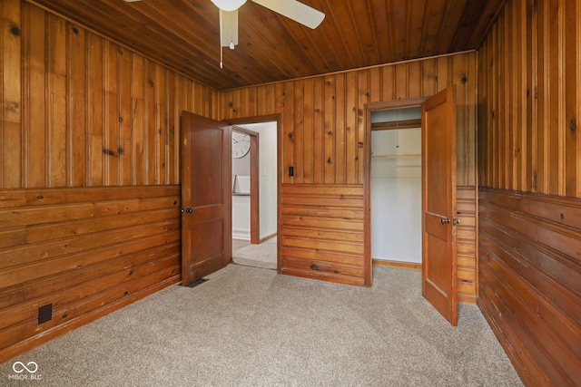 11710 W State Road 32, Yorktown, IN 47396 - unfurnished bedroom featuring wooden walls, carpet flooring, wooden ceiling, and a ceiling fan