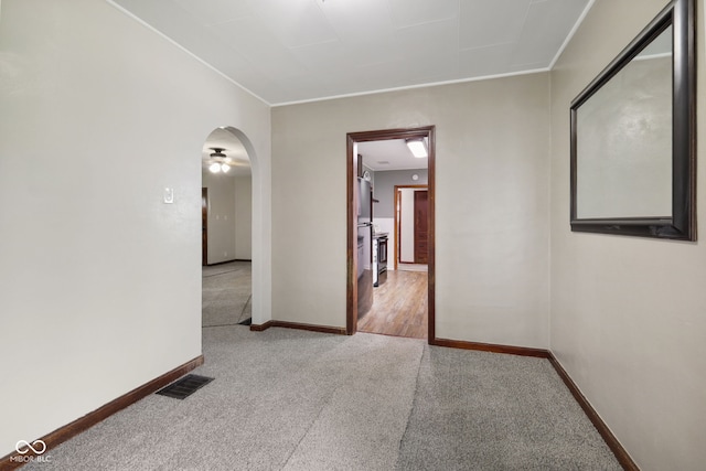 11710 W State Road 32, Yorktown, IN 47396 - corridor with carpet flooring, arched walkways, and crown molding