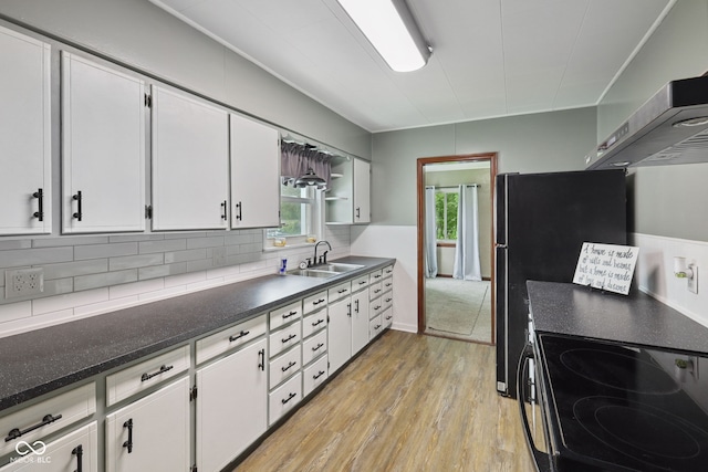 11710 W State Road 32, Yorktown, IN 47396 - kitchen with light wood finished floors, white cabinetry, and tasteful backsplash