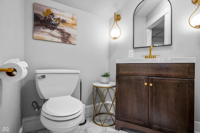 545 Fletcher Ave, Indianapolis, IN 46203 - bathroom featuring marble finish flooring and vanity