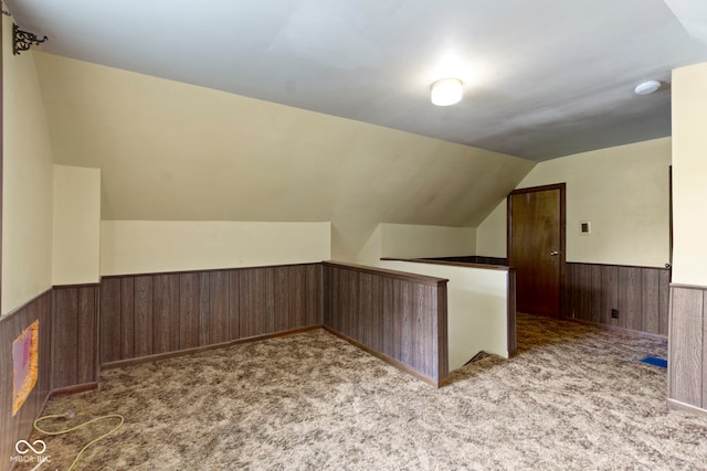 29 E Caven St, Indianapolis, IN 46225 - bonus room with wainscoting, vaulted ceiling, wood walls, and carpet