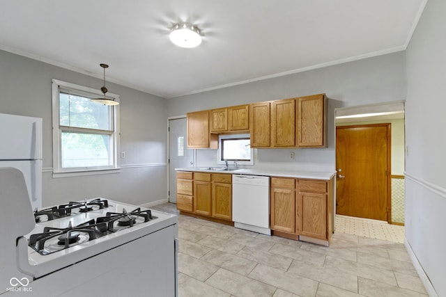 29 E Caven St, Indianapolis, IN 46225 - kitchen with white appliances, light countertops, ornamental molding, decorative light fixtures, and brown cabinets