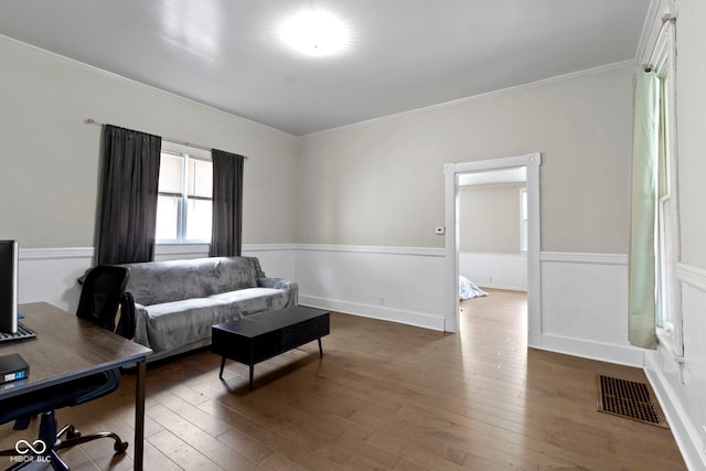 29 E Caven St, Indianapolis, IN 46225 - living area featuring hardwood / wood-style floors, crown molding, a desk, and a wainscoted wall