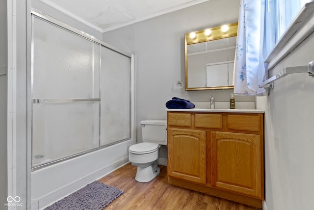 29 E Caven St, Indianapolis, IN 46225 - bathroom with vanity, crown molding, combined bath / shower with glass door, and wood finished floors