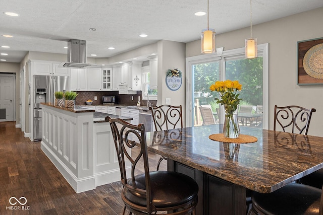 3710 Canada Ct, West Lafayette, IN 47906 - dining space with dark wood-style flooring, recessed lighting, and a textured ceiling