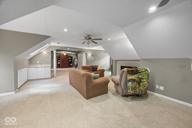 3710 Canada Ct, West Lafayette, IN 47906 - cinema room featuring a ceiling fan, light colored carpet, decorative columns, lofted ceiling, and recessed lighting