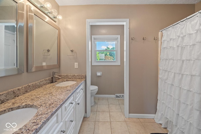 3710 Canada Ct, West Lafayette, IN 47906 - full bath featuring double vanity, a shower with shower curtain, and tile patterned floors
