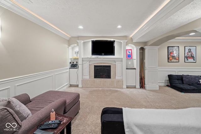 3710 Canada Ct, West Lafayette, IN 47906 - carpeted living room with ornate columns, a decorative wall, a wainscoted wall, ornamental molding, and recessed lighting
