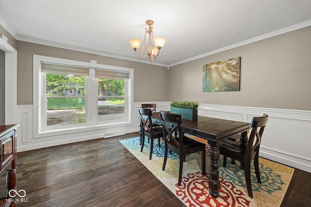 3710 Canada Ct, West Lafayette, IN 47906 - dining space with a chandelier, ornamental molding, a wainscoted wall, dark wood-type flooring, and a textured ceiling
