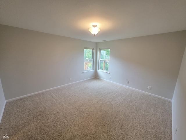 21 Watson Dr, Trafalgar, IN 46181 - carpeted empty room featuring baseboards