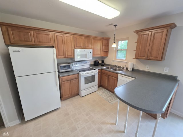 21 Watson Dr, Trafalgar, IN 46181 - kitchen with white appliances, dark countertops, open shelves, and brown cabinets