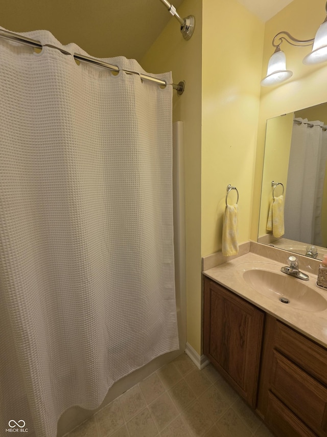 21 Watson Dr, Trafalgar, IN 46181 - bathroom featuring vanity, a shower with shower curtain, and tile patterned floors