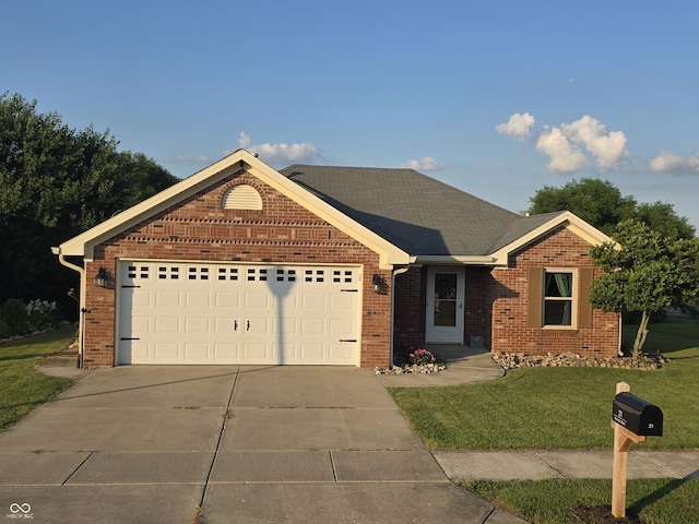 21 Watson Dr, Trafalgar, IN 46181 - single story home featuring driveway, brick siding, an attached garage, and a front lawn