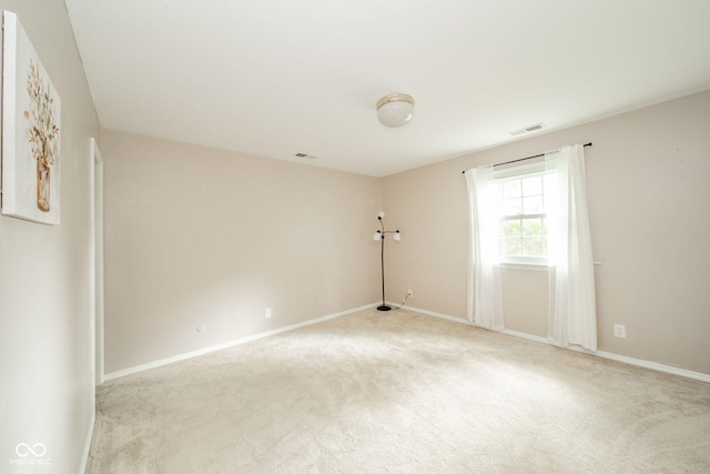 2613 W Queensbury Rd, Muncie, IN 47304 - spare room with light carpet