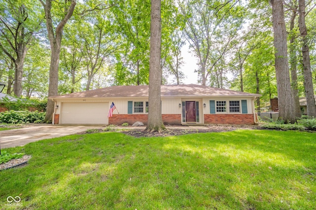 2613 W Queensbury Rd, Muncie, IN 47304 - ranch-style home with brick siding, an attached garage, a front yard, and concrete driveway