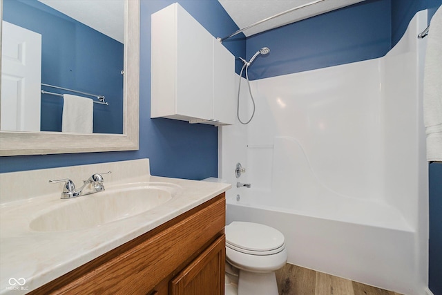 16629 Greensboro Dr, Westfield, IN 46074 - full bathroom featuring wood finished floors,  shower combination, and vanity