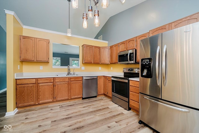 16629 Greensboro Dr, Westfield, IN 46074 - kitchen with appliances with stainless steel finishes, light wood-style flooring, light countertops, decorative light fixtures, and a chandelier