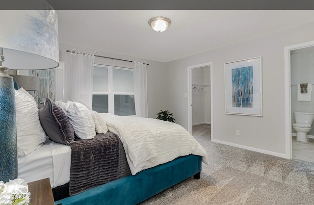 3933 Wren Dr, Brownsburg, IN 46112 - bedroom with carpet, a spacious closet, and ensuite bathroom