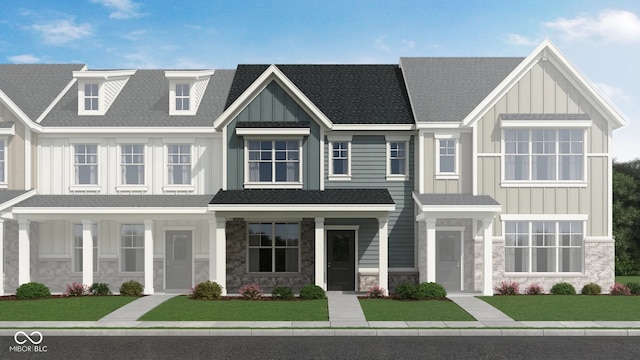 3933 Wren Dr, Brownsburg, IN 46112 - multi unit property featuring stone siding, board and batten siding, and a front yard