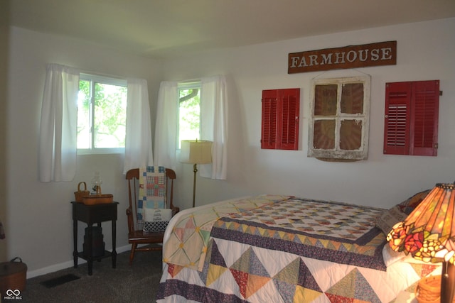 704 S Rockfield Rd, Veedersburg, IN 47987 - bedroom with carpet floors and baseboards