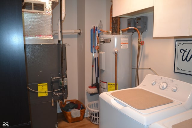 704 S Rockfield Rd, Veedersburg, IN 47987 - washroom featuring washer / dryer, water heater, and heating unit