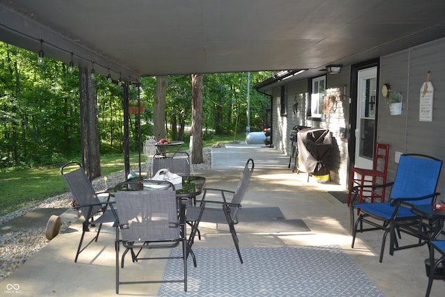 704 S Rockfield Rd, Veedersburg, IN 47987 - view of patio / terrace with a grill and outdoor dining space