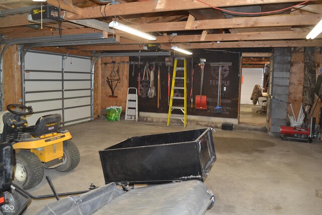 704 S Rockfield Rd, Veedersburg, IN 47987 - garage featuring a garage door opener