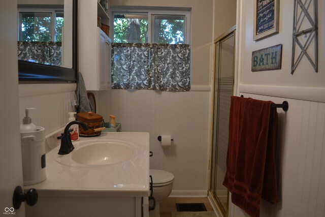 704 S Rockfield Rd, Veedersburg, IN 47987 - full bath with a stall shower, a wainscoted wall, and vanity