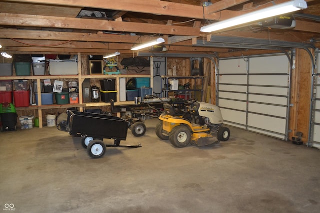 704 S Rockfield Rd, Veedersburg, IN 47987 - garage featuring a garage door opener