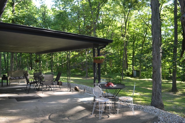 704 S Rockfield Rd, Veedersburg, IN 47987 - view of community featuring a patio area and outdoor dining area
