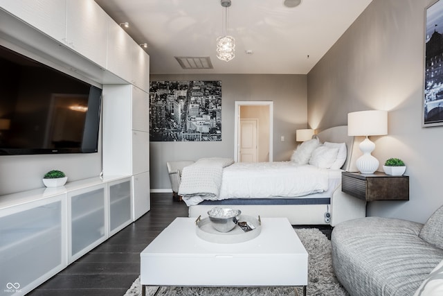 225 N New Jersey St Unit 52, Indianapolis, IN 46204 - bedroom featuring dark wood finished floors