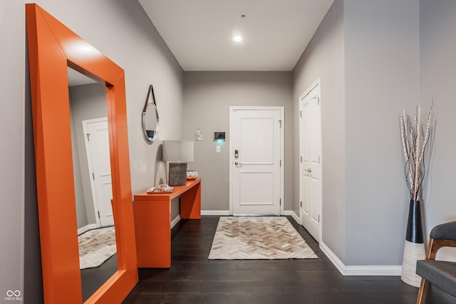 225 N New Jersey St Unit 52, Indianapolis, IN 46204 - foyer with wood finished floors and baseboards