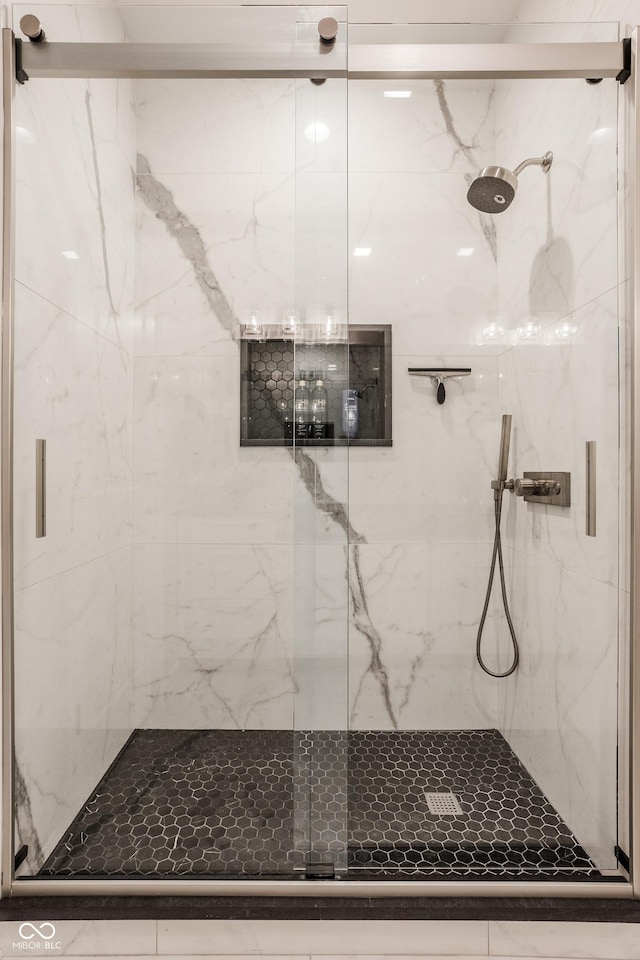 225 N New Jersey St Unit 52, Indianapolis, IN 46204 - bathroom featuring a marble finish shower