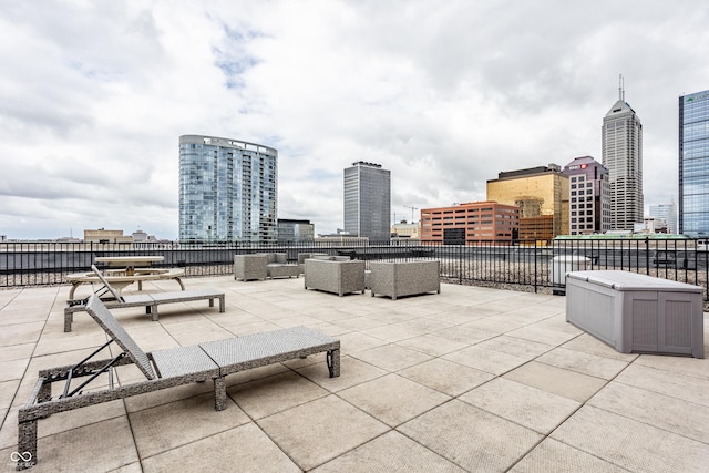 225 N New Jersey St Unit 52, Indianapolis, IN 46204 - view of patio / terrace featuring a skyline view