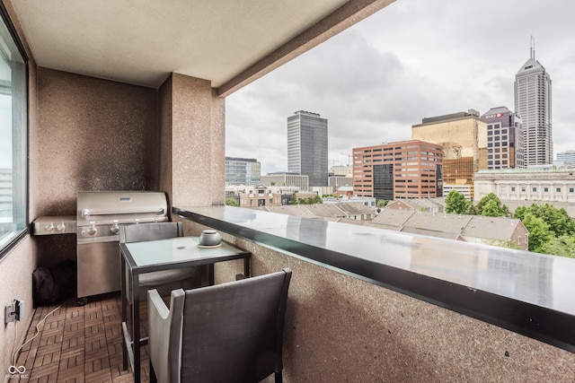 225 N New Jersey St Unit 52, Indianapolis, IN 46204 - balcony featuring a city view and area for grilling