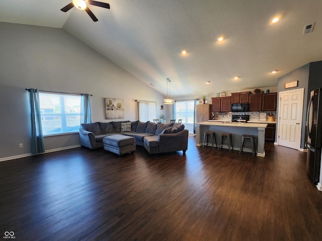 7511 Eddie Ln, Camby, IN 46113 - living room with a ceiling fan, dark wood finished floors, recessed lighting, and high vaulted ceiling