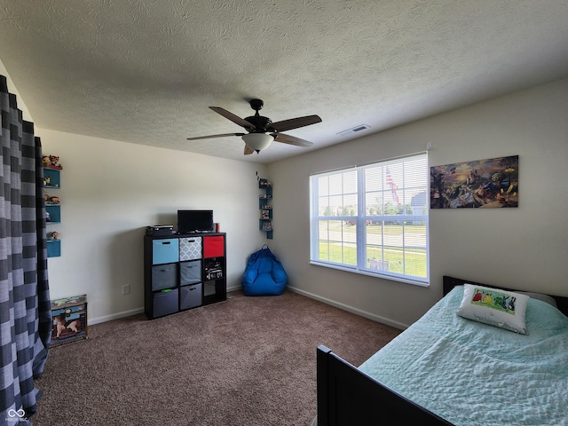 7511 Eddie Ln, Camby, IN 46113 - bedroom with carpet flooring, a ceiling fan, and a textured ceiling