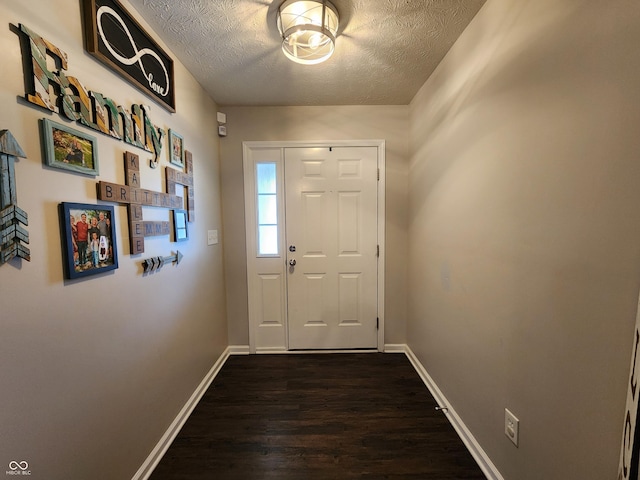 7511 Eddie Ln, Camby, IN 46113 - doorway to outside featuring dark wood-style flooring and a textured ceiling