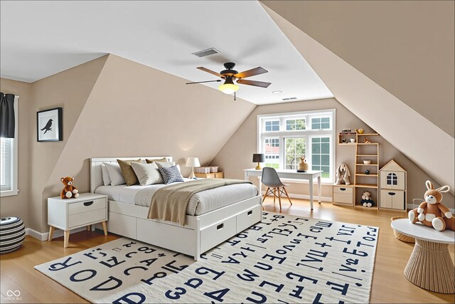 13779 Stone Dr, Carmel, IN 46032 - bedroom with wood finished floors, lofted ceiling, and a ceiling fan