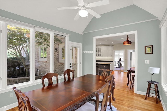 13779 Stone Dr, Carmel, IN 46032 - dining room featuring plenty of natural light, light wood-style floors, lofted ceiling, a ceiling fan, and recessed lighting