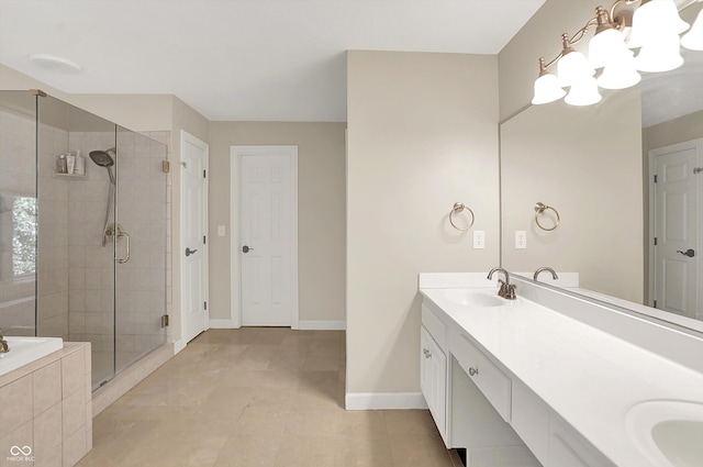 13779 Stone Dr, Carmel, IN 46032 - full bathroom featuring double vanity, a stall shower, a chandelier, and a garden tub