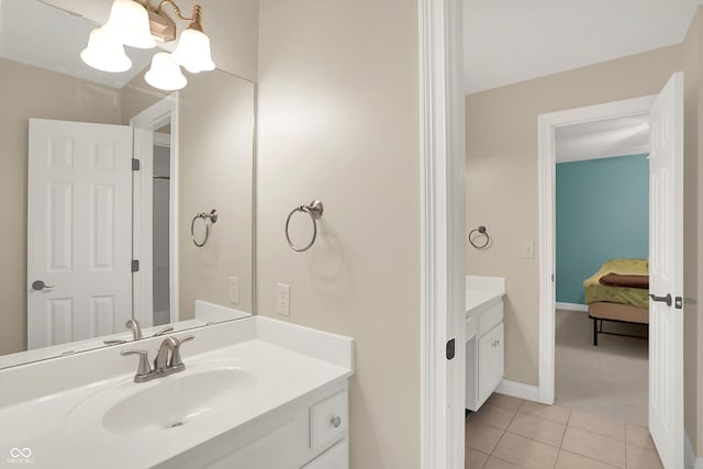 13779 Stone Dr, Carmel, IN 46032 - bathroom featuring vanity, tile patterned floors, and ensuite bathroom