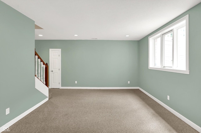 13779 Stone Dr, Carmel, IN 46032 - carpeted empty room featuring stairs and recessed lighting