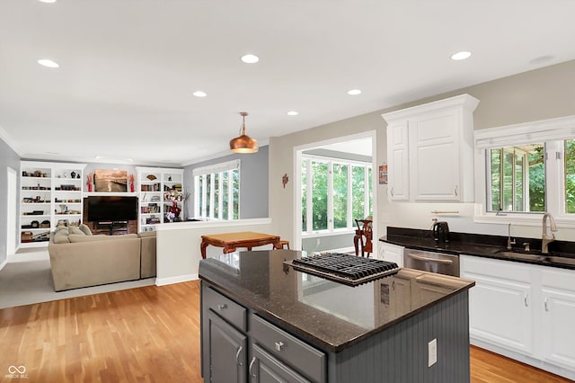 13779 Stone Dr, Carmel, IN 46032 - kitchen featuring gray cabinetry, healthy amount of natural light, stainless steel appliances, recessed lighting, and light wood-type flooring