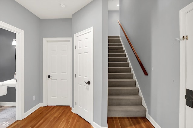 13779 Stone Dr, Carmel, IN 46032 - stairs featuring wood finished floors
