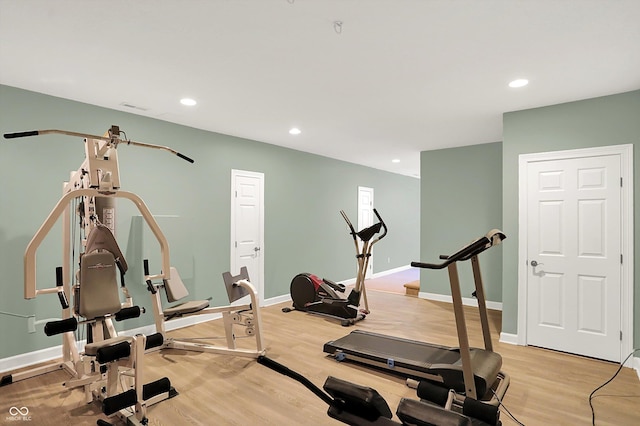 13779 Stone Dr, Carmel, IN 46032 - exercise area with light wood-style floors and recessed lighting
